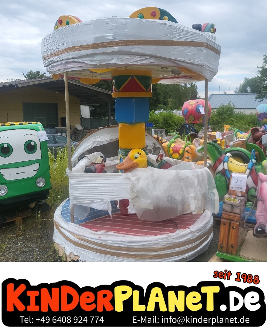 3er Karussell mit einer Ente und zwei Motorrädern