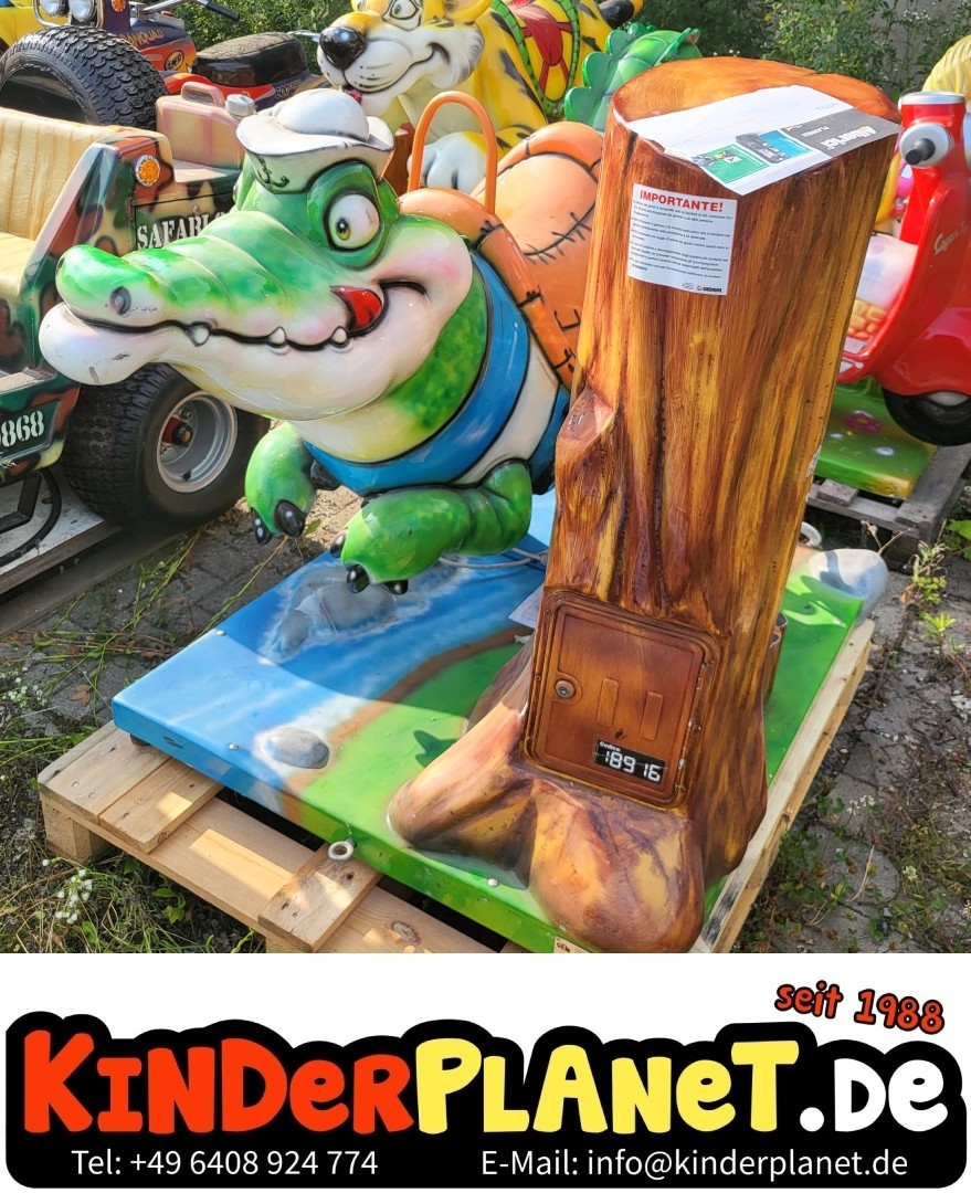Krokodil mit Baum als Kassensäule
